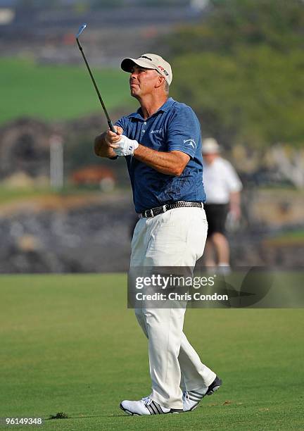 Tom Lehman hits from the fairway on during the final round of the Mitsubishi Electric Championship at Hualalai held at Hualalai Golf Club on January...