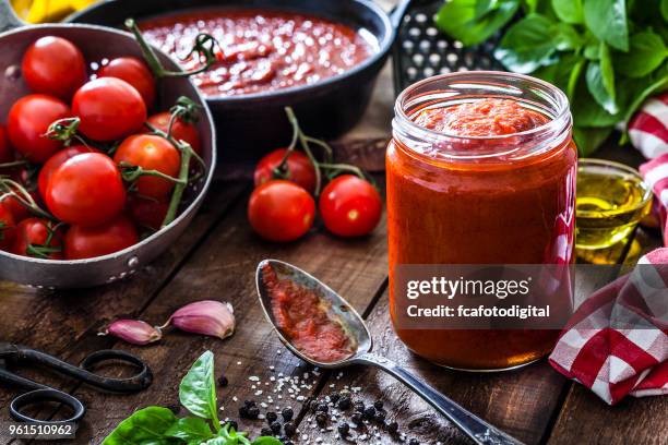 tomato sauce - tomato paste stock pictures, royalty-free photos & images