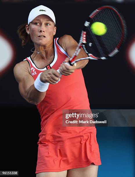 Samantha Stosur of Australia plays a backhand in her fourth round match against Serena Williams of the United States of America during day eight of...