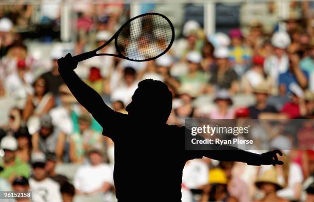 Nicolas Almagro of Spain plays a backhand in his fourth round match against Jo-Wilfried Tsonga of France during day eight of the 2010 Australian Open...