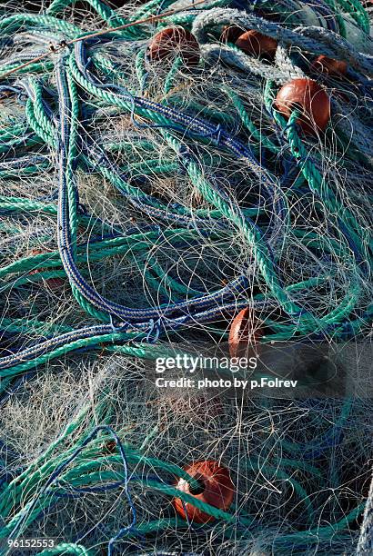fishing nets used om medi - pfolrev stockfoto's en -beelden