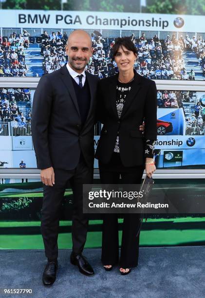 Manchester City Manager Pep Guardiola and his wife Cristina Serra are pictured during An Evening With Mike Rutherford, The Mechanics and Friends at...