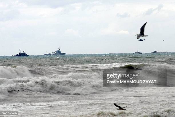 Lebanese army helicopters and United Nations and other vessels scan the sea off the Lebanese coast south of the capital Beirut, following the crash...