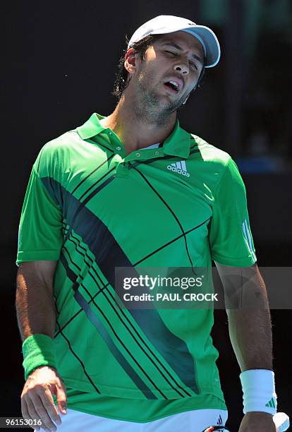 Fernando Verdasco of Spain reacts while playing against Nikolay Davydenko of Russia in their men's singles fourth round match on day eight of the...