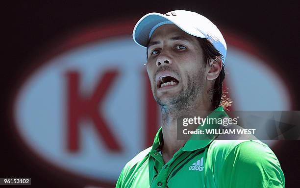 Fernando Verdasco of Spain reacts while playing against Nikolay Davydenko of Russia in their men's singles fourth round match on day eight of the...