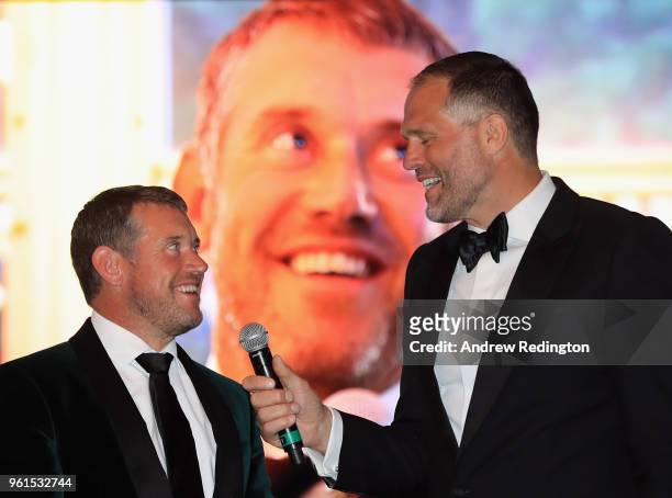 Lee Westwood of England and Martin Bayfield, former England rugby player and MC for the night, are pictured together during An Evening With Mike...