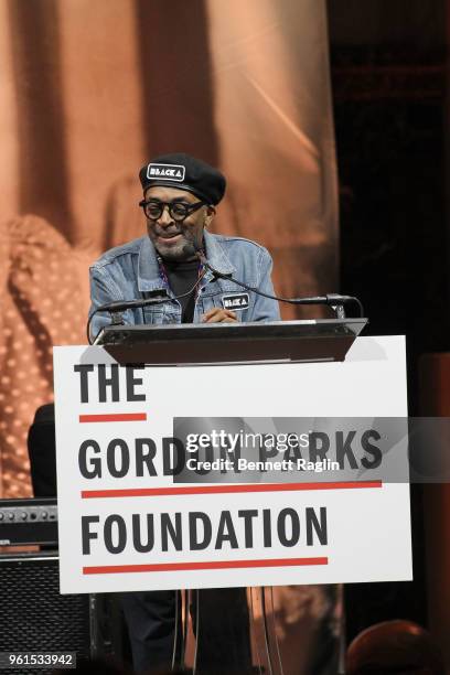 Film Director, Presenter Spike Lee speaks on stage at Gordon Parks Foundation: 2018 Awards Dinner & Auction at Cipriani 42nd Street on May 22, 2018...