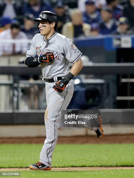 Derek Dietrich of the Miami Marlins celebrates his two run home run in the eighth inning against the New York Mets at Citi Field on May 22, 2018 in...