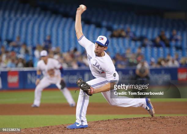Tyler Clippard of the Toronto Blue Jays delivers a pitch in the ninth inning during MLB game action against the Los Angeles Angels of Anaheim at...