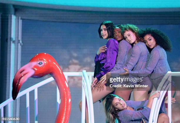 Singer Dua Lipa performs onstage at the 2018 Billboard Music Awards at the MGM Grand Garden Arena on May 20, 2018 in Las Vegas, Nevada.