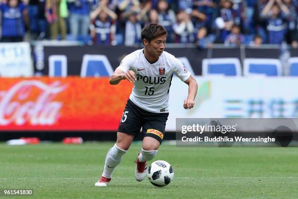 Kazuki Nagasawa of Urawa Red Diamonds in action during the J.League J1 match between Gamba Osaka and Urawa Red Diamonds at Panasonic Stadium Suita on...