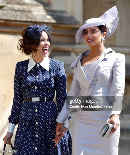 Abigail Spencer and Priyanka Chopra attend the wedding of Prince Harry to Ms Meghan Markle at St George's Chapel, Windsor Castle on May 19, 2018 in...