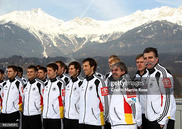 The German Handball national squad and head coach Heiner Brand pose during for a photocall on the roof at the Golden Baer hotel on January 25, 2009...