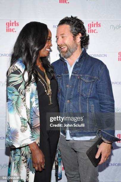 Nyakio Kamoche Grieco and David Grieco attend Ali Larter & Shannon Rotenberg Host Nyakio Launch Event At RONROBINSON at Fred Segal Melrose on May 22,...