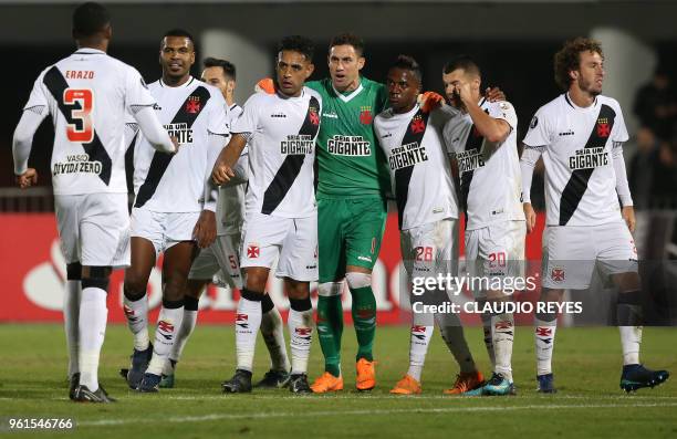 Players of Brazil's Vasco da Gama celebrate after defeating Chile's Universidad de Chile 2-0 in their Copa Libertadores football match at the...