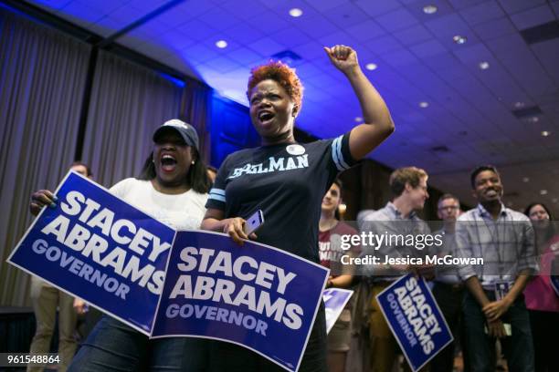 Stefanie Roberts and Tonetta Collins, Spelman College friends of Georgia Democratic Gubernatorial candidate Stacey Abrams, cheer during a primary...