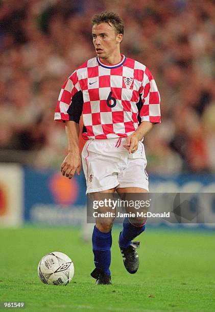 Dario Simic of Croatia runs with the ball during the International Friendly match against Republic of Ireland played at Lansdowne Road, in Dublin,...