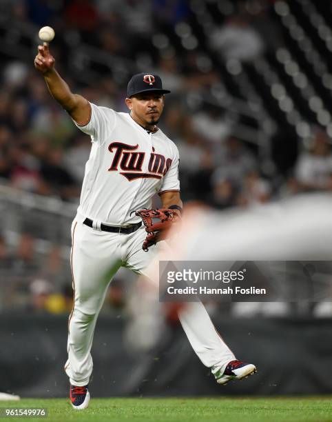 Eduardo Escobar of the Minnesota Twins makes a play to get out John Hicks of the Detroit Tigers at first base during the sixth inning of the game on...