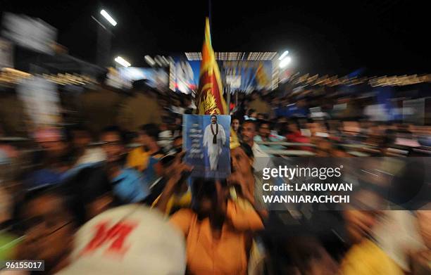 Supporters of Sri Lanka's President Mahinda Rajapakse attend an election rally in the Colombo suburb of Piliyandala on January 23, 2010. Piliyandala...