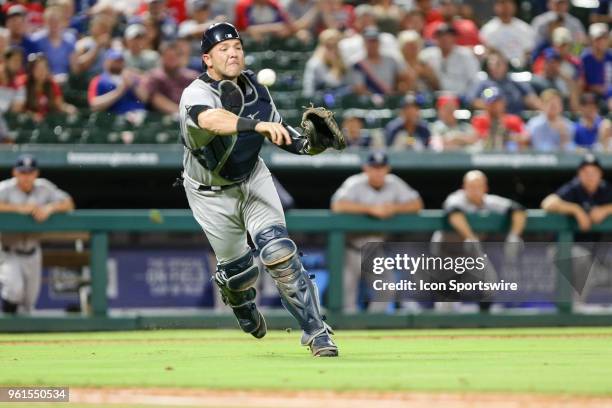 New York Yankees catcher Gary Sanchez picks up the bunt and throws to first base during the game between the Texas Rangers and the New York Yankees...