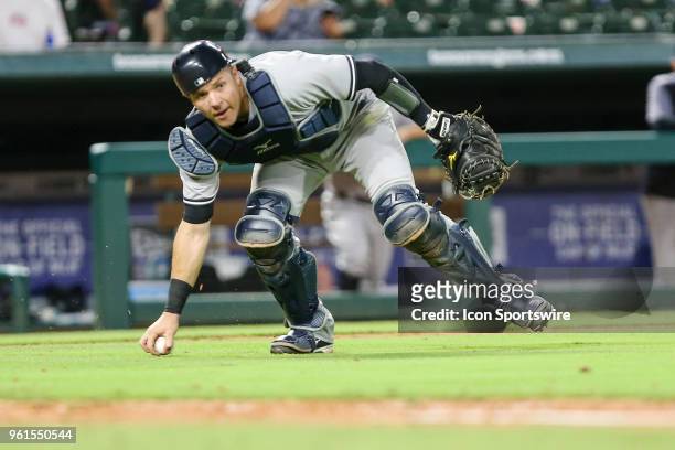 New York Yankees catcher Gary Sanchez picks up the bunt and throws to first base during the game between the Texas Rangers and the New York Yankees...