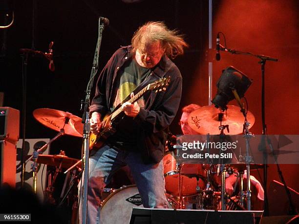 Neil Young and Chad Cromwell perform on stage on day 2 of Hard Rock Calling 2009 in Hyde Park on June 27, 2009 in London, England.