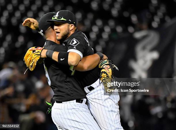 Chicago White Sox first baseman Jose Abreu lifts up Chicago White Sox second baseman Yolmer Sanchez after getting the win against the Baltimore...