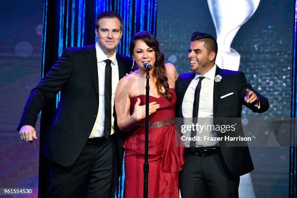 Brian Moote, Nina Hajian, and Edgar Sotelo speak onstage at the 43rd Annual Gracie Awards at the Beverly Wilshire Four Seasons Hotel on May 22, 2018...