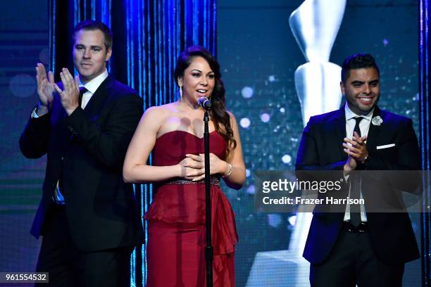 Brian Moote, Nina Hajian, and Edgar Sotelo speak onstage at the 43rd Annual Gracie Awards at the Beverly Wilshire Four Seasons Hotel on May 22, 2018...