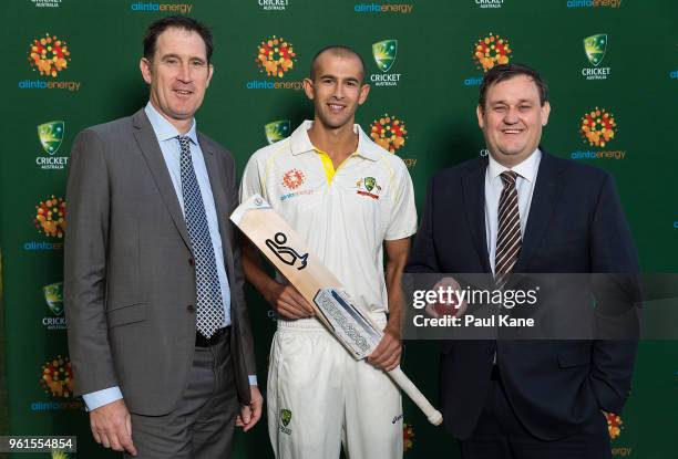 Cricket Australia CEO James Sutherland, Ashton Agar and Alinta Energy CEO Jeff Dimery pose at Optus Stadium on May 23, 2018 in Perth, Australia.