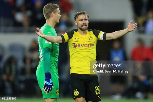 Marcel Schmelzer looks for an offside call as Dominik Reimann of Borussia Dortmund looks on during the second half of an International friendly...