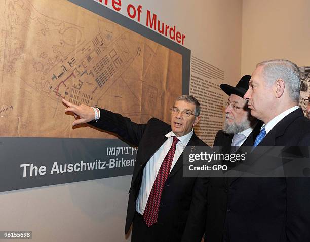 In this handout image supplied by the Israeli Government Press Office , Prime Minister Benjamin Netanyahu and Yad Vashem director Avner Shalev...