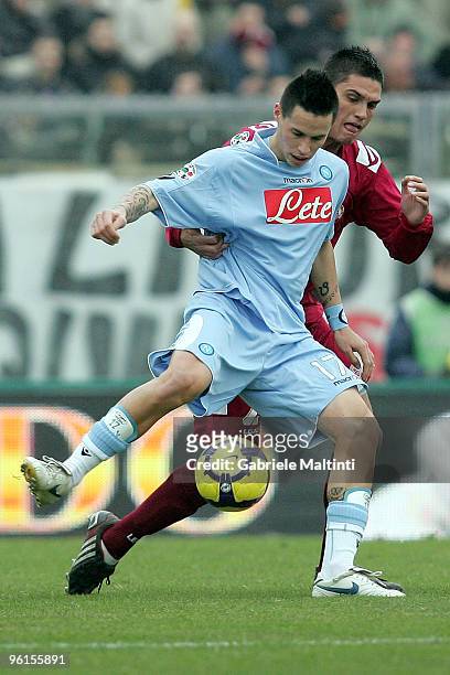 Romano Perticone of AS Livorno in action against Marek Hamsik of SSC Napoli during the Serie A match between Livorno and Napoli at Stadio Armando...