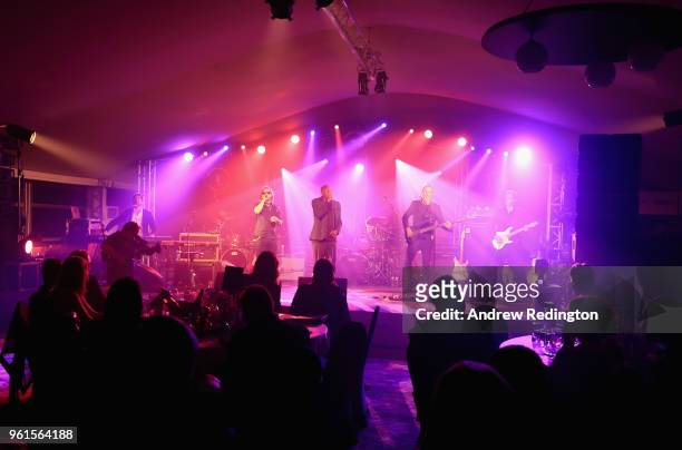 The band performs during An Evening With Mike Rutherford, The Mechanics and Friends at the BMW PGA Championship at Wentworth on May 22, 2018 in...