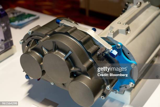 Xing Mobility Inc.'s torque vectoring gear box stands on display in Hong Kong, China, on Wednesday, May 23, 2018. Xing Mobility Chief Executive...