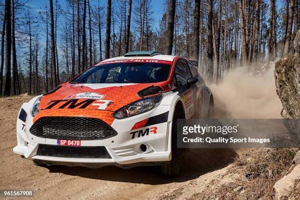 Hiroki Arai of Japan and Glenn Macneall of Australia in their Ford Fiesta R5 during day three of World Rally Championship Portugal on May 19, 2018 in...