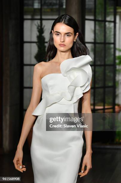 Model walks the runway at Oscar De La Renta Resort 2019 Runway Show at Academy Mansion on May 22, 2018 in New York City.