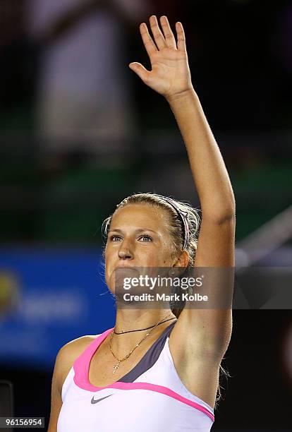 Victoria Azarenka of Belarus waves to the crowd after winning her fourth round match against Vera Zvonareva of Russia during day eight of the 2010...