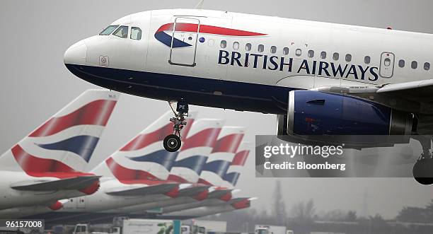 British Airways airplane comes into land at Terminal 5 at Heathrow airport in London, U.K., on Monday, Jan. 25, 2010. British Airways Plc will today...