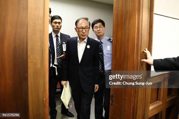 Former South Korean President Lee Myung-Bak appears for his first trial at the Seoul Central District Court on May 23, 2018 in Seoul, South Korea....