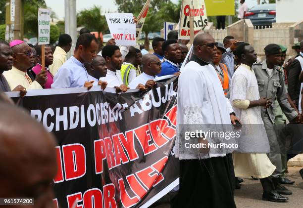 Catholic faithful stage a peaceful protest to condemn the rampant killing in Benue State, North Central of Nigeria in Abuja, Nigeria's capital on May...