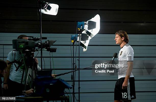 Mario Gomez of the Geman national football team is seen shooting a commercial during the German Football Association media day on January 25, 2010 in...