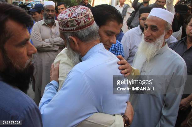Abdul Aziz , father of slain Pakistani exchange student Sabika Sheikh, who was killed during a school shooting in Texas, meets with people during his...