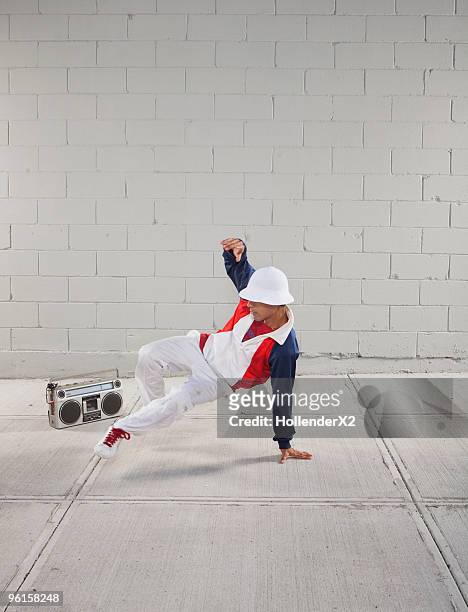 man breakdancing - only young men stock pictures, royalty-free photos & images