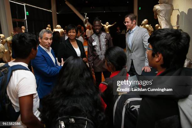 Nick Keller, Dr Mae Jemison, Kai Kamara and Jesse Lovejoy talk with guests during an ESPN leadership dinner at Levi's Stadium on May 22, 2018 in...