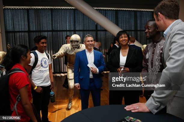 Nick Keller, Dr Mae Jemison, Kai Kamara and Jesse Lovejoy talk with guests during an ESPN leadership dinner at Levi's Stadium on May 22, 2018 in...