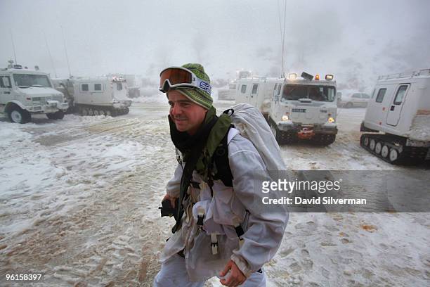 An Israeli alpine unit soldier returns to a military base from an outpost higher up the snow-covered slopes January 25, 2010 of Mount Hermon in the...