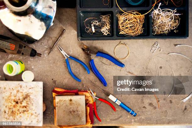 overhead view of jewelry making tools - ワイヤーカッター ストックフォトと画像