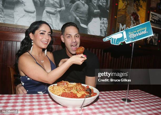 Angelina Pivarnick and fiancee Christopher Larangeira pose as Pivarnick promotes "Jersey Shore: Family Vacation" as she visits Buca di Beppo Times...