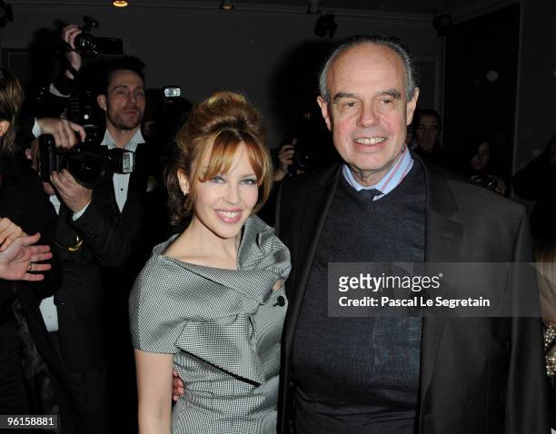 Kylie Minogue and Frederic Mitterand, the French Minister of Culture and Communication, attends the Christian Dior Haute-Couture show as part of the...